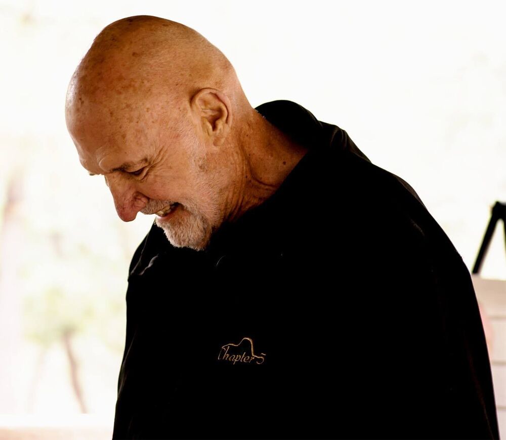 Candid portrait of a man looking downward