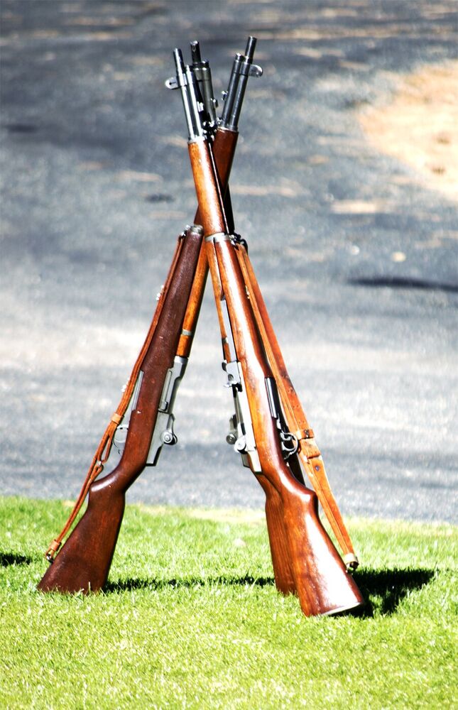 Ceremonial rifles arranged together before a service