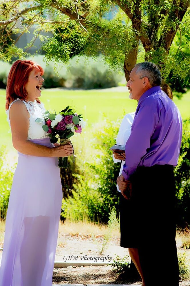 A newly married couple sharing a quiet outdoor moment